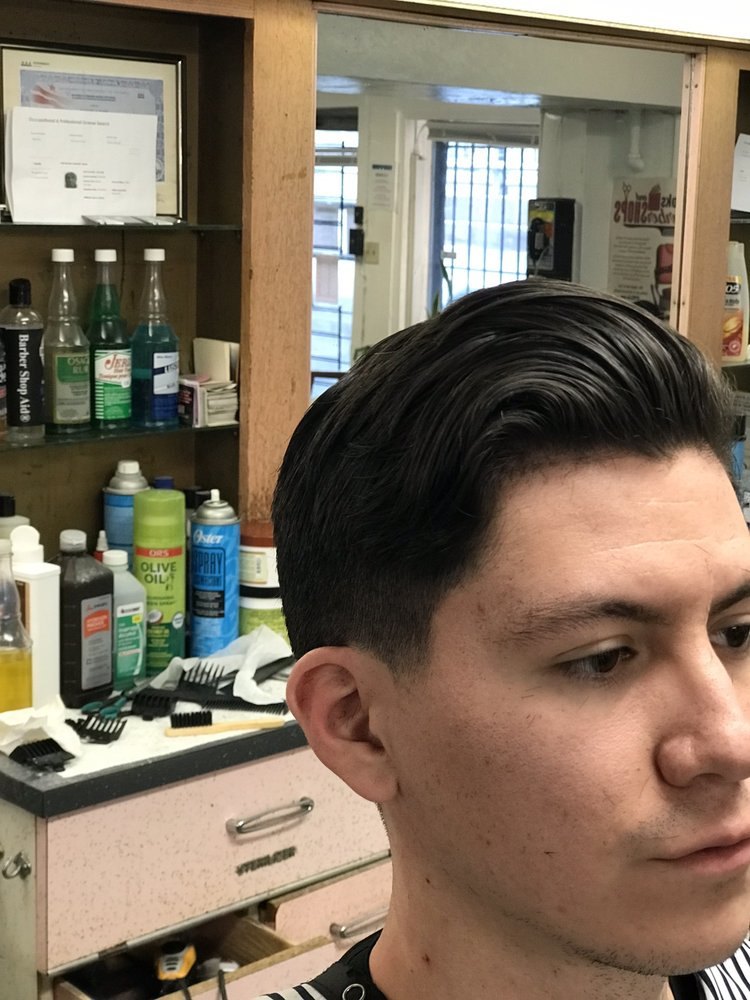 Fresh classic cut beside the station's tonic bottles